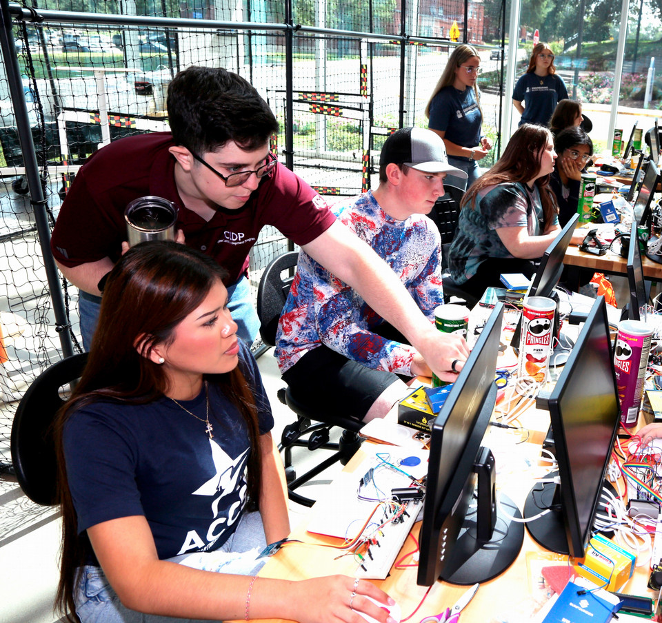 Former camp participants return to mentor the next generation of cybersecurity students.